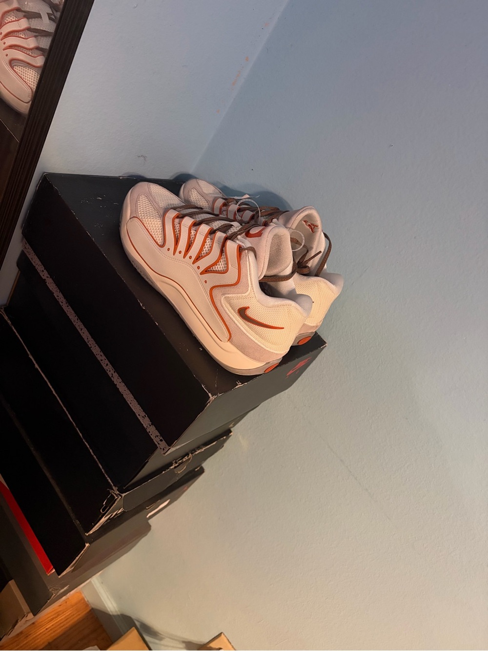 Nike Kids White Sneakers with Orange Accents